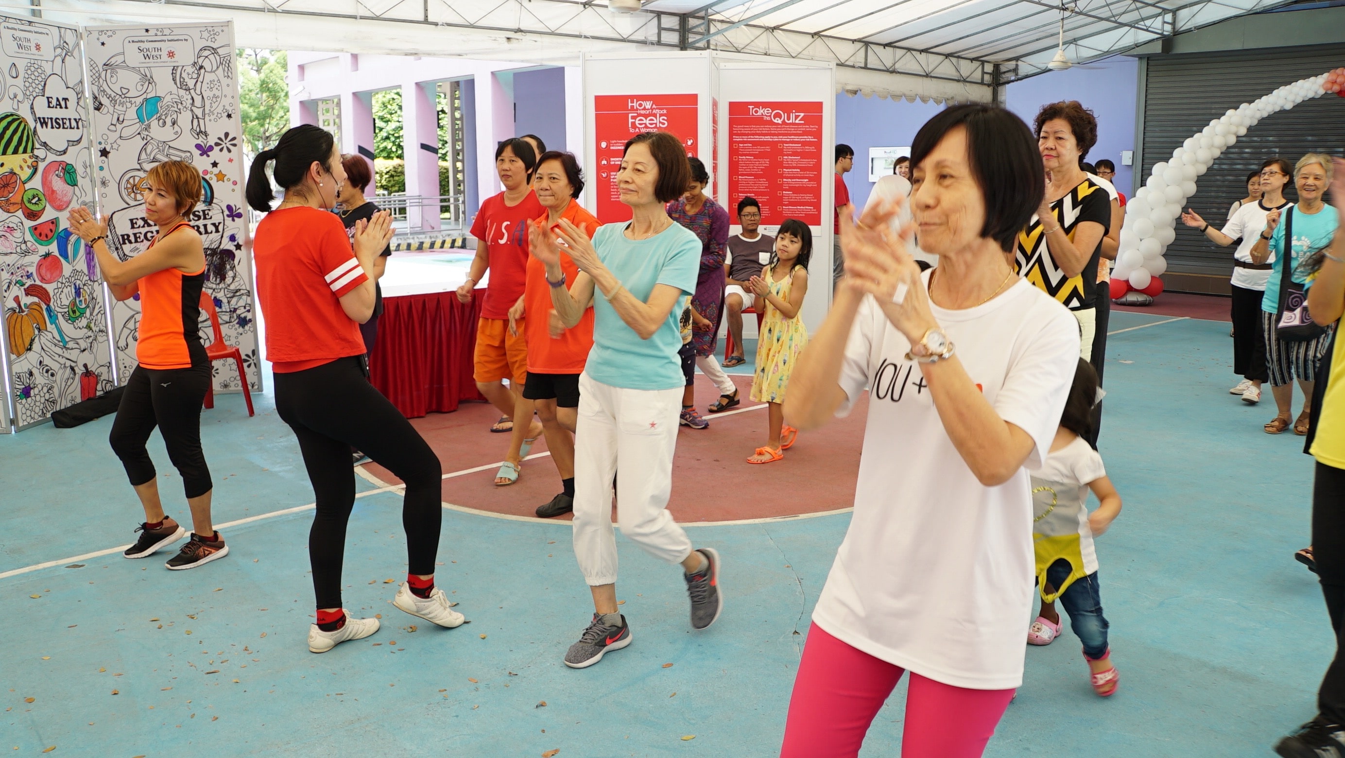 Residents participating in a dance exercise