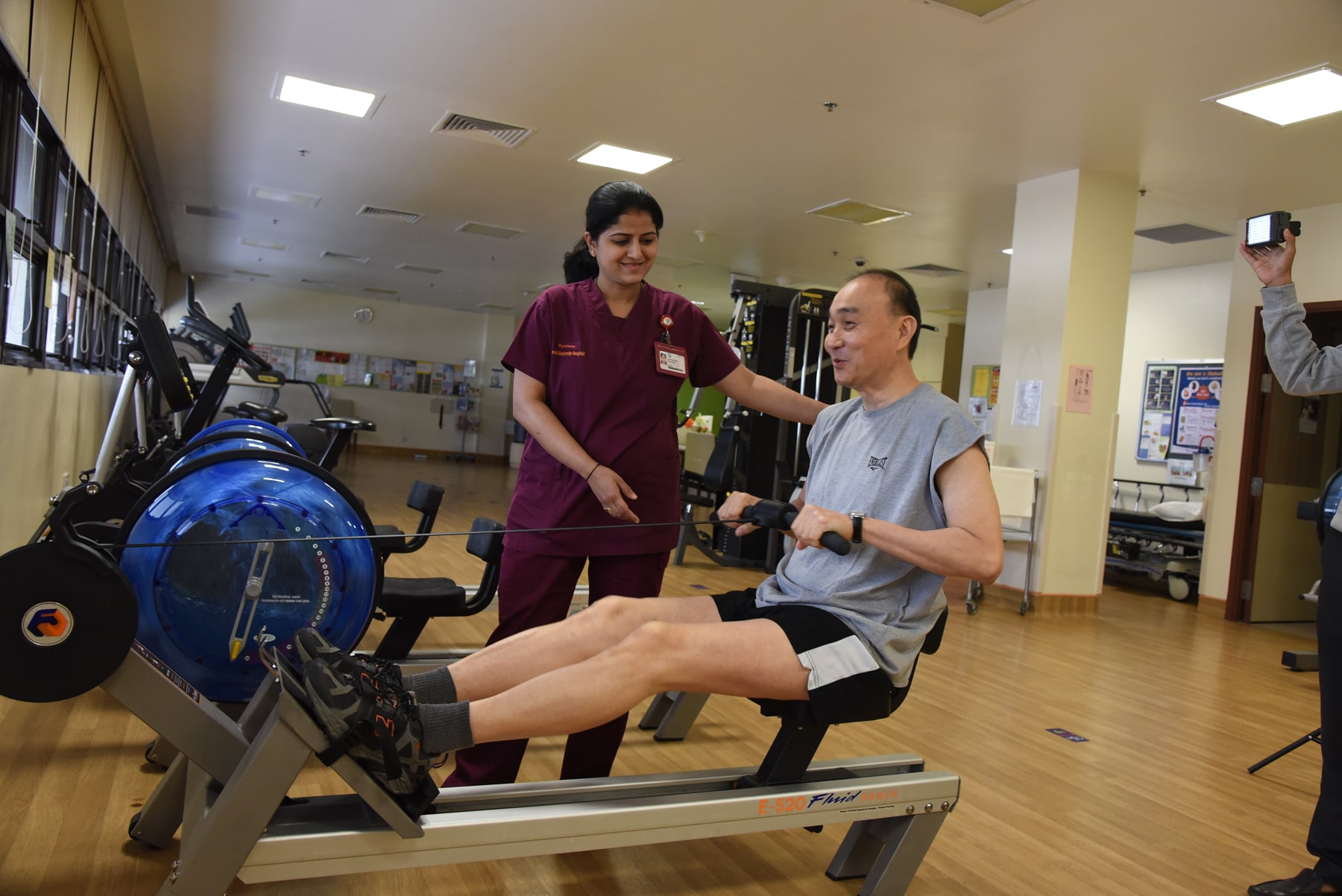 Nurse assisting a man 